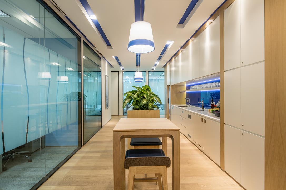 modern-office-pantry-corridor-with-light-wood